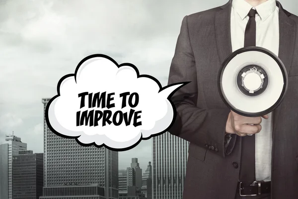 Time to improve text on speech bubble with businessman and megaphone — Stock Photo, Image