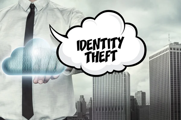 Texto de robo de identidad en el tema de computación en nube con hombre de negocios —  Fotos de Stock