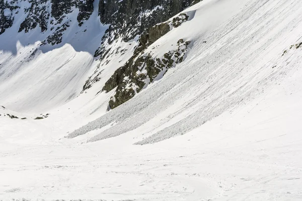 Small avalanches in mountains. — Stock Photo, Image