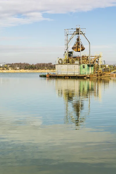 Old dredge on bagry. — Stock Photo, Image