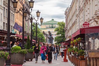 Tourists walk on pedestrian street in center of St. Petersburg  clipart