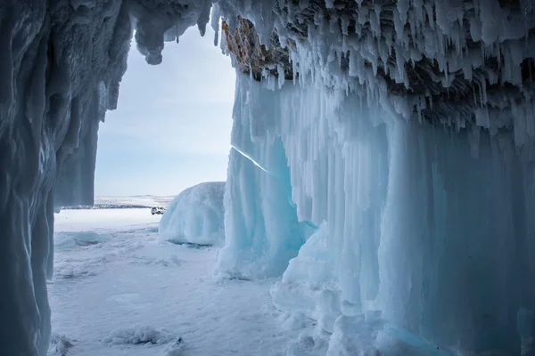 Ice cave, Icicles in the rocky caves, Lake Baikal in winter, Siberia, Russia