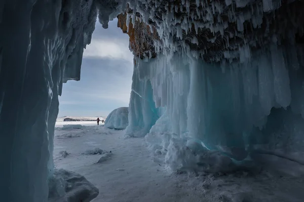 Ice cave, Icicles in the rocky caves, Lake Baikal in winter, Siberia, Russia
