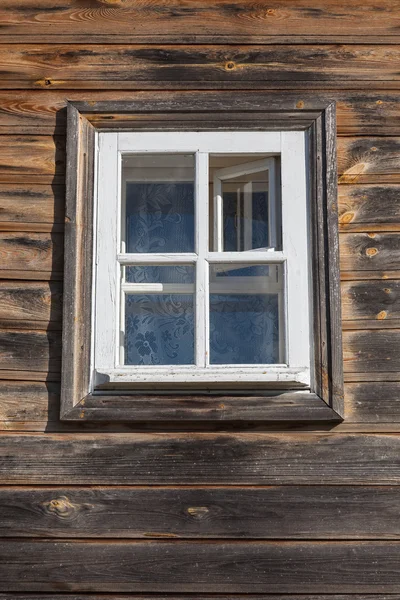 Window in an old wooden house — Stock Photo, Image