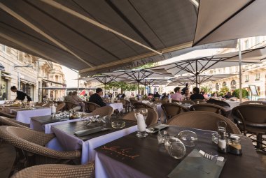 French outdoor cafe tables under a canopy from the sun, Bordeaux