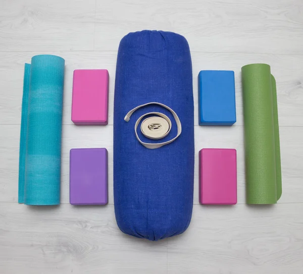 Iyengar yoga props blocks, strap, roller and carpet — Stock Photo, Image