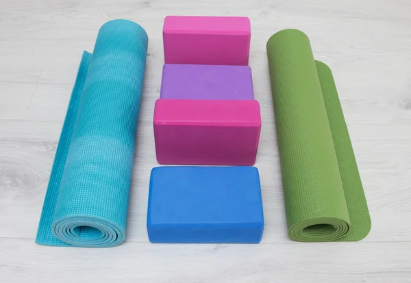 Iyengar yoga props blocks, strap, roller and carpet — Stock Photo, Image