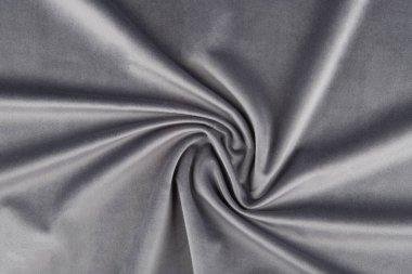 Kumaş dokusu - üst görünüm ve ezilmiş gri kadife parçasının yakın çekimi