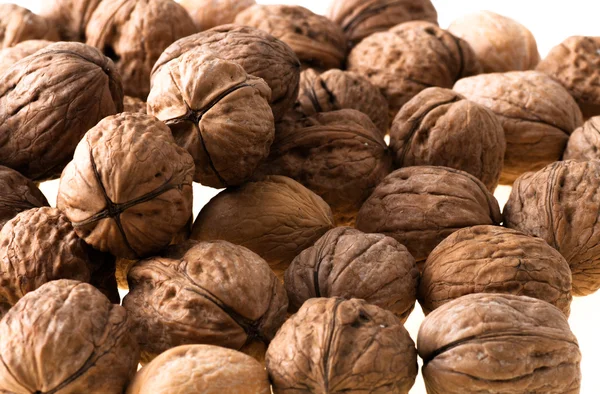Walnuts in the foreground for diet — Stock Photo, Image