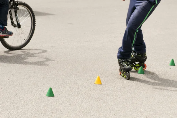 Slalom with Inline skates Royalty Free Stock Images