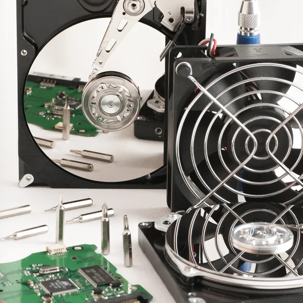 Details of hard disk drive open and a fan Stock Picture