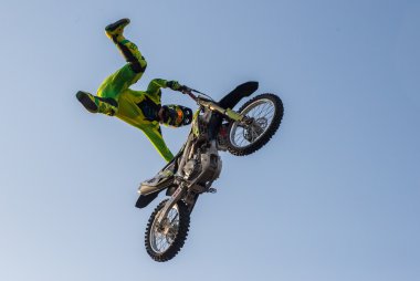 KHABAROVSK - AUG 23: A professional rider at the FMX (Freestyle  clipart