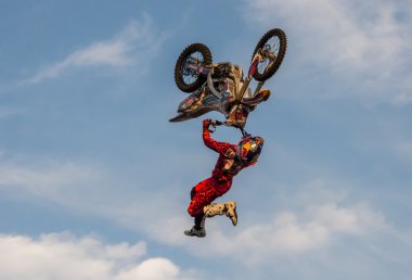 KHABAROVSK - AUG 23: A professional rider at the FMX (Freestyle  clipart