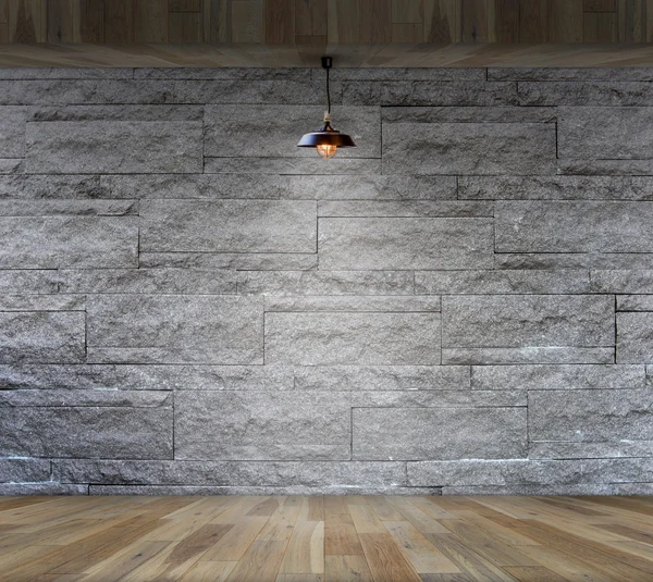 Wnętrze granit kamień dekoracyjny mur z wnętrza lampy — Zdjęcie stockowe