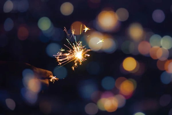 Female Hands Holding Sparkler Bokeh Background Glittering Burning Sparkler Celebration — Stock Photo, Image