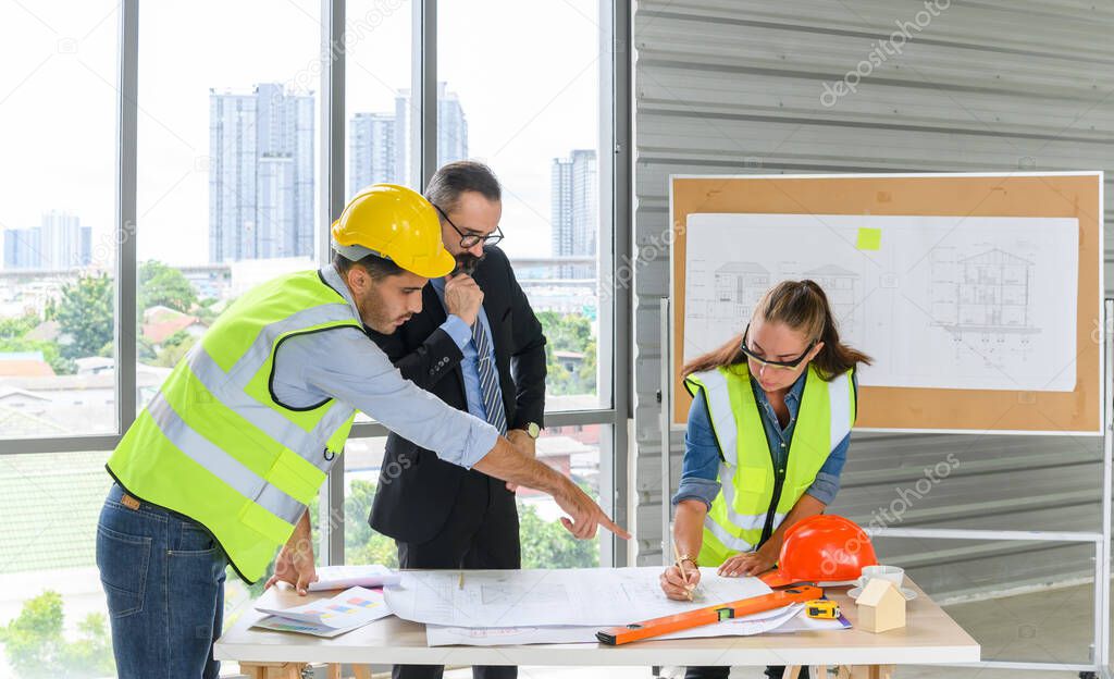 Engineers team meeting for architectural project. architects discussing blueprint with construction manager in office worker conference site. Construction Concept