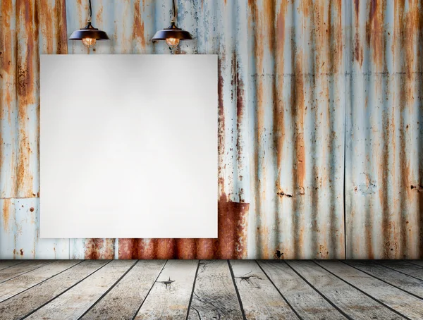 Blank frame on Rusted galvanized iron plate with wood floor — Stock Photo, Image