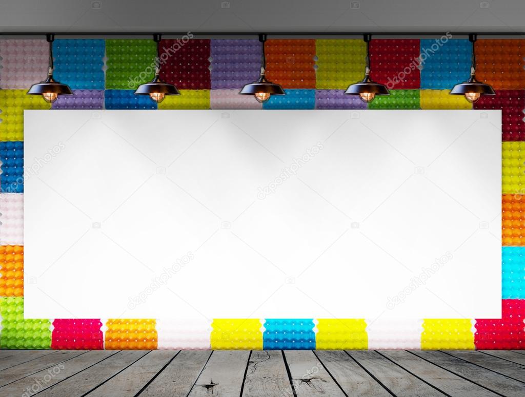 Blank frame on Colorful Paper egg tray wall and wood floor for information message