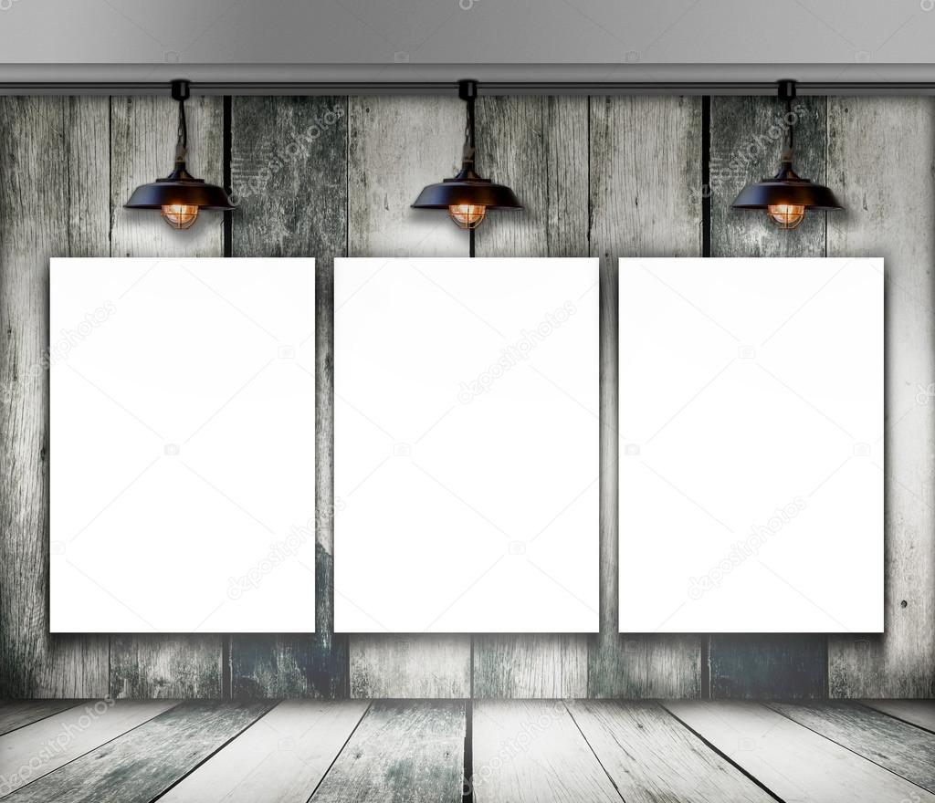Blank frame on wood wall with Ceiling lamp