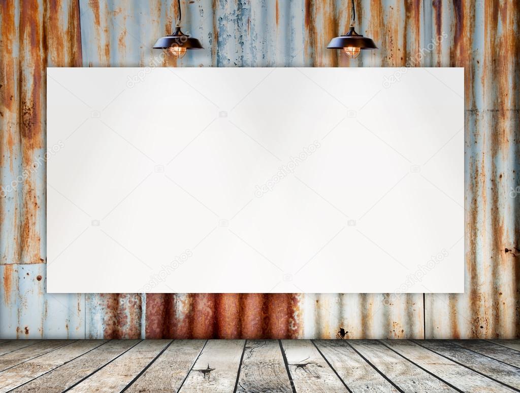 Blank frame on Rusted galvanized iron plate with wood floor