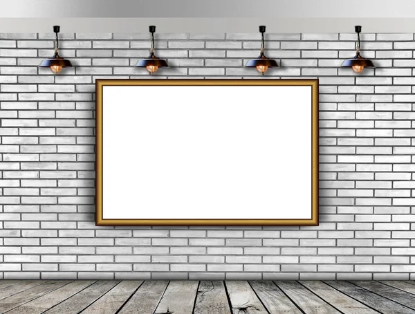 Blank picture frame on the brick wall and the wooden floor — Stock Photo, Image