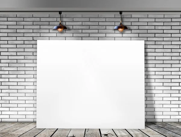 Poster standing in White Brick wall with Ceiling lamp — Stock Photo, Image