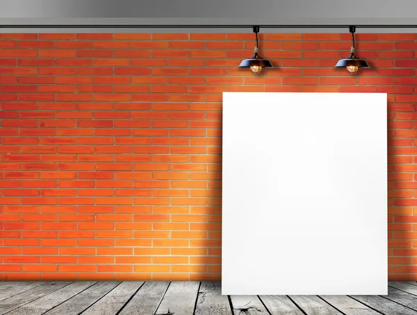 Poster standing in Brick wall with Ceiling lamp — Stock Photo, Image