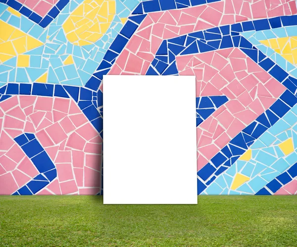 Blank Poster with Colorful mosaic tile wall and green lawn for information message — Stock Photo, Image