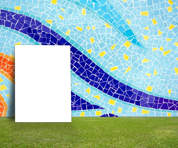 Blank Poster with Colorful mosaic tile wall and green lawn for information message — Stock Photo, Image