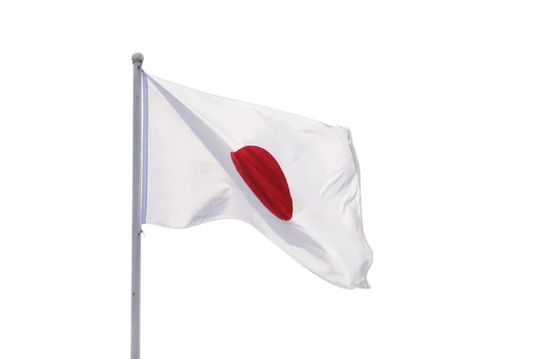 在旗杆上飘扬的日本国旗 — 图库照片