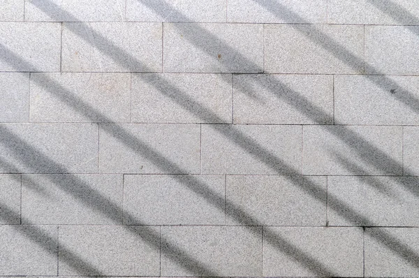 Line shadow on stone wall — Stock Photo, Image