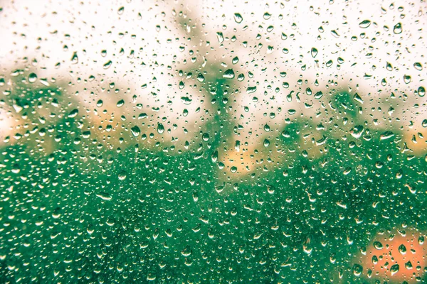 Abstrakte Wassertropfen auf dem Spiegel — Stockfoto