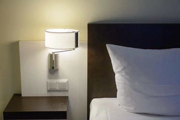 Wall lamp in modern bedroom — Stock Photo, Image