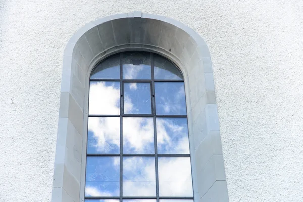 Clouds reflected in classic windows — Stock Photo, Image