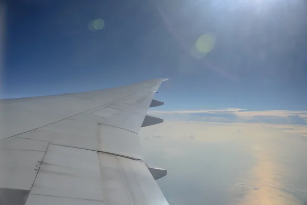 Clouds and sky from window plane — Stock Photo, Image