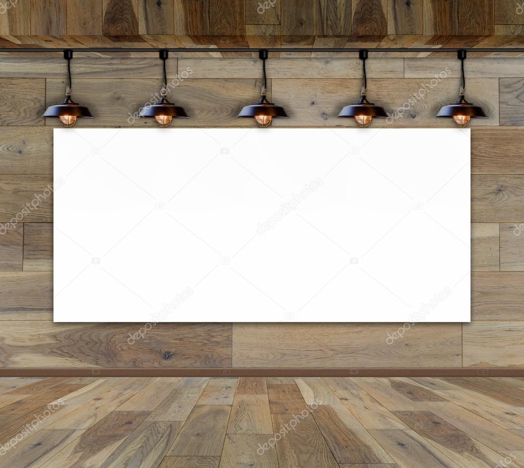 Blank frame on wood wall with Ceiling lamp