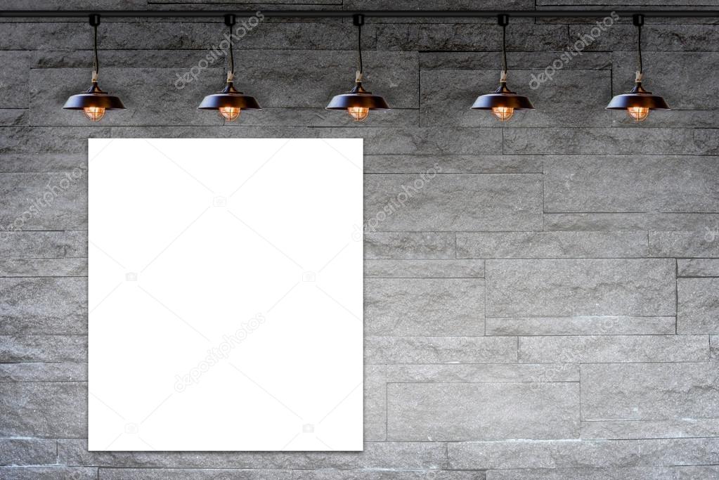 Blank frame on Granite stone decorative brick wall with lamp for information message