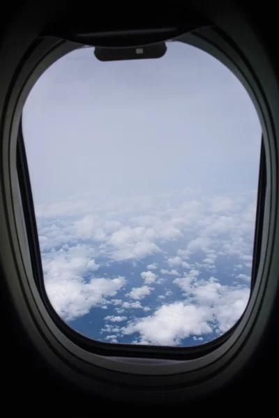 Clouds and sky from airplane window — Stock Photo, Image