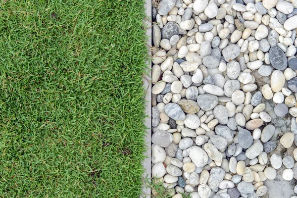 Green grass with Pebbles, Stone and grass in garden, grass with rock, Pebble with Grass, background — Stock Photo, Image