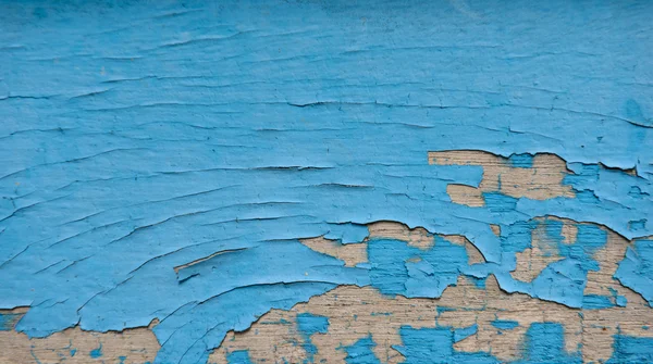 Gebarsten kleur verf op houten muur — Stockfoto