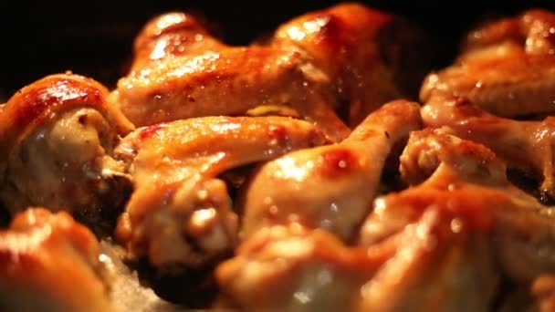 Chicken drummets deep frying in oil — Stock Video