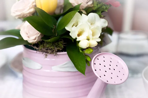 Romantic bouquet in flower pot in form of watering can