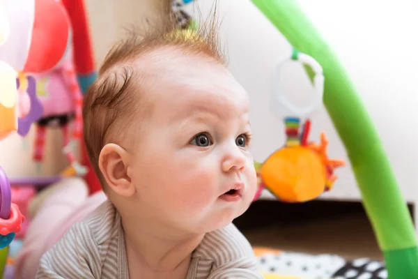 Baby playing with toys — Stock Photo, Image