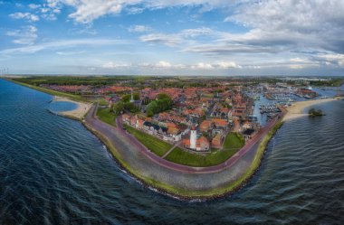 Panorama-aerial view of Urk with its lighthouse, a small coastal village on the IJsselmeer in the Netherlands