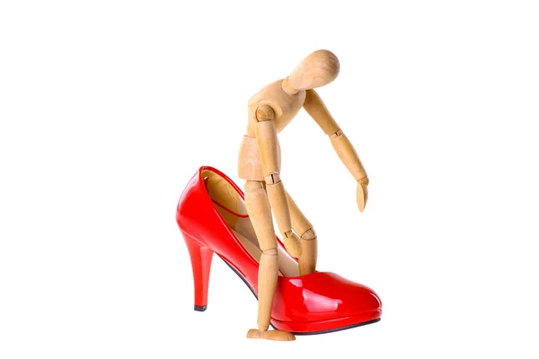 Wooden dummy in the shoe fitting — Stock Photo, Image