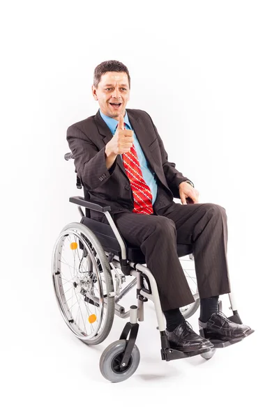 Бизнесмен в инвалидном кресле — стоковое фото