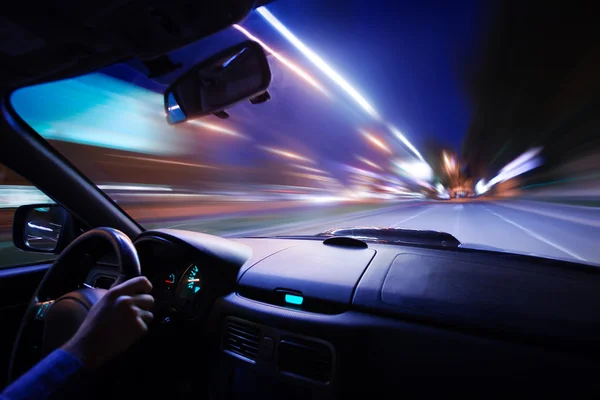 Car speed night drive on the road in city — Stock Photo, Image