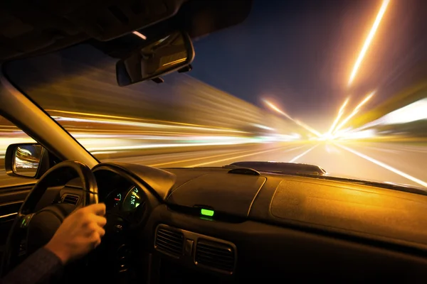 Car speed night drive on the road in city — Stock Photo, Image