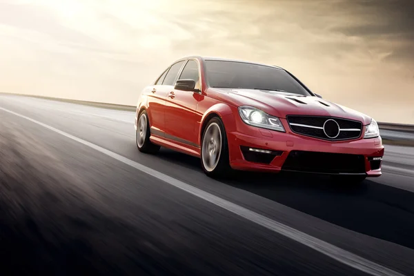 Fast drive red sport car speed on the road mercedes-benz — Stock Photo, Image