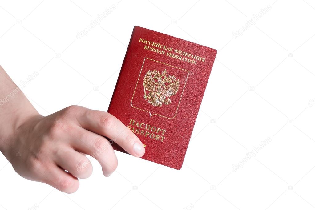 Russian passport hold in arm isolated on white